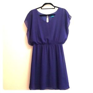 Flowy, silky blue open back dress